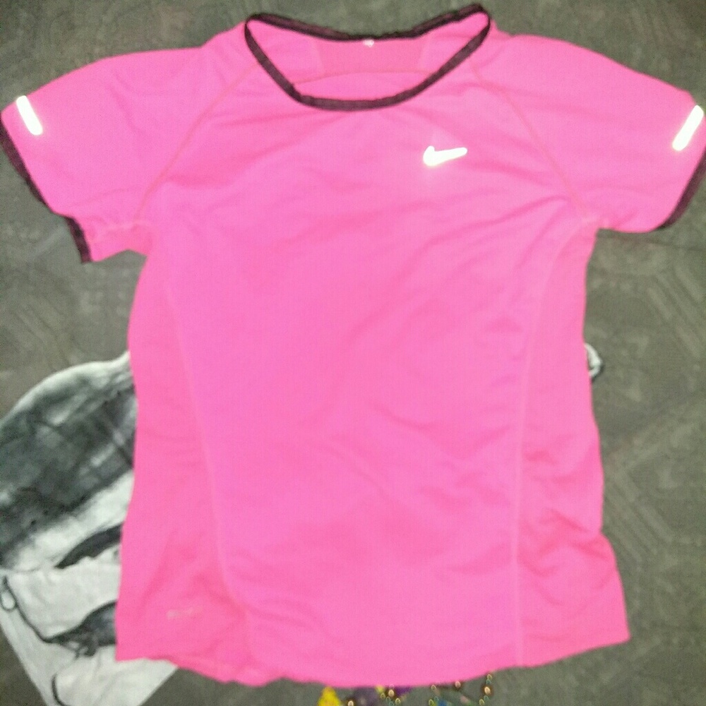 Pink dri fit nike shirt with zip up pocket in back
